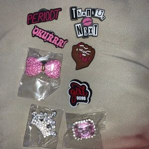 14 brand new girly croc pins. came in a pack but they aren’t my type